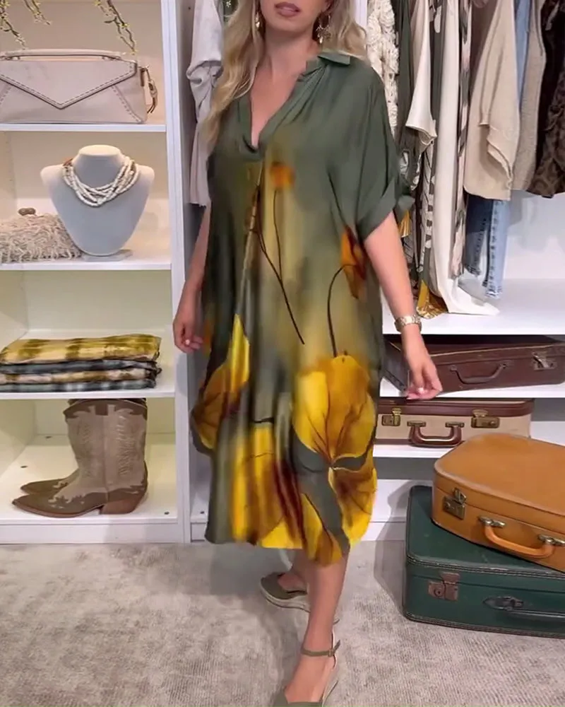 Elegant dress with leaf print and lapel
