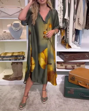 Elegant dress with leaf print and lapel