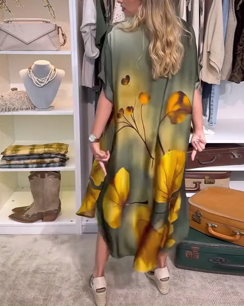 Elegant dress with leaf print and lapel